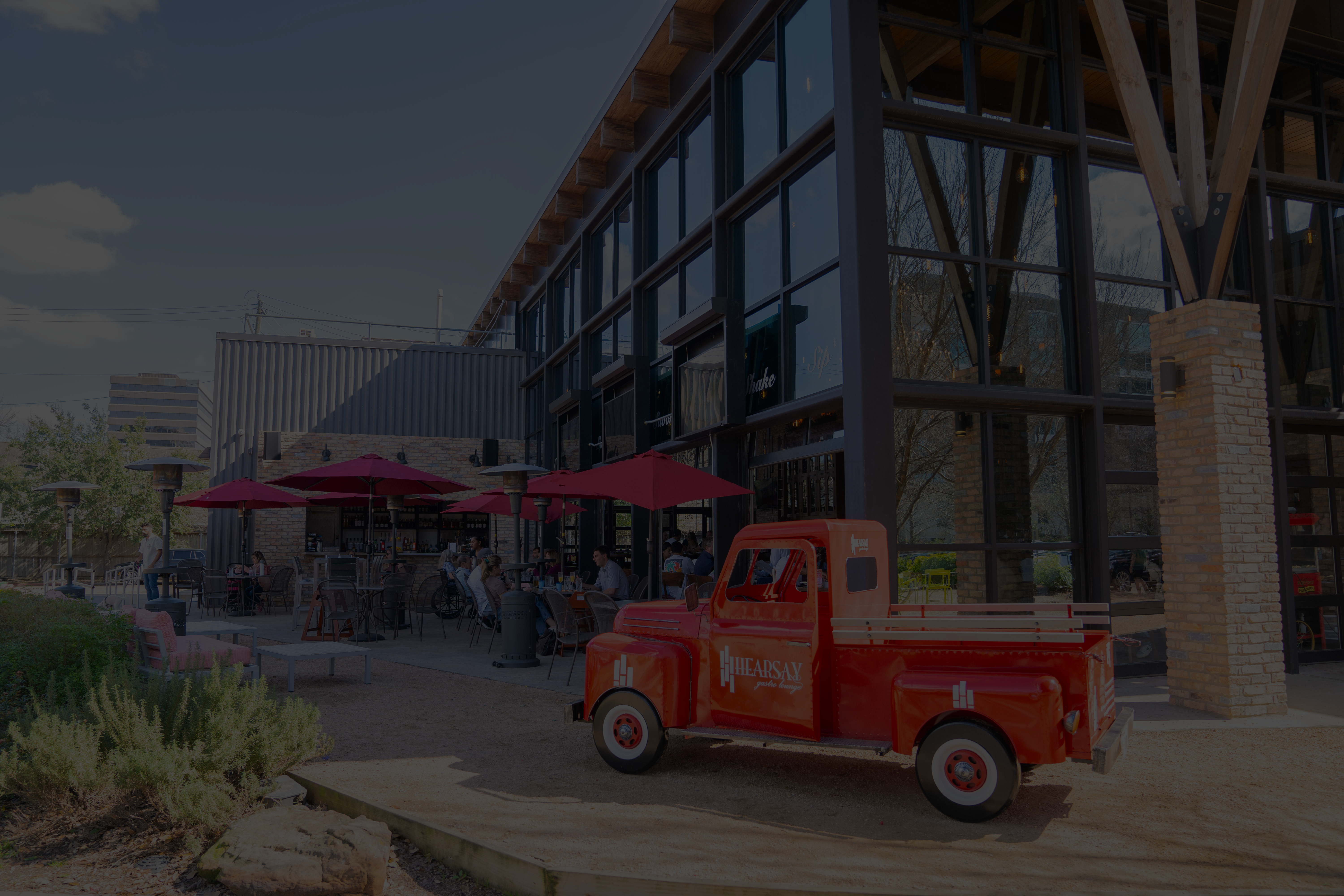 Elegant restaurant interior with warm lighting and exposed brick walls